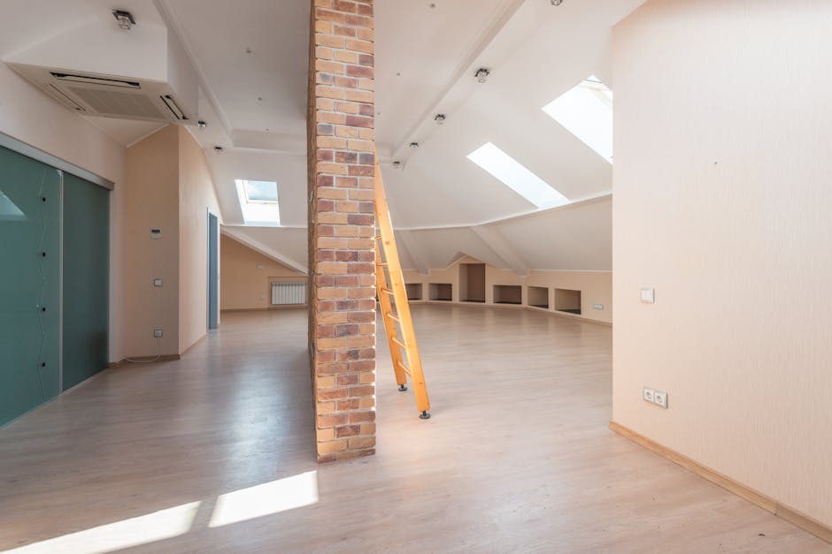 Installing attic insulation in a residential home